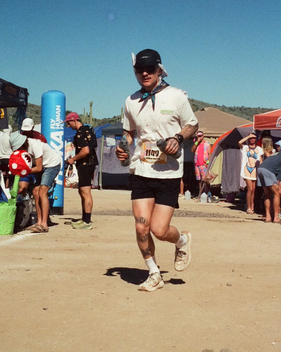 Ben Garcia, founder and owner of Ultra Men Property Services, running an ultramarathon in the Arizona desert