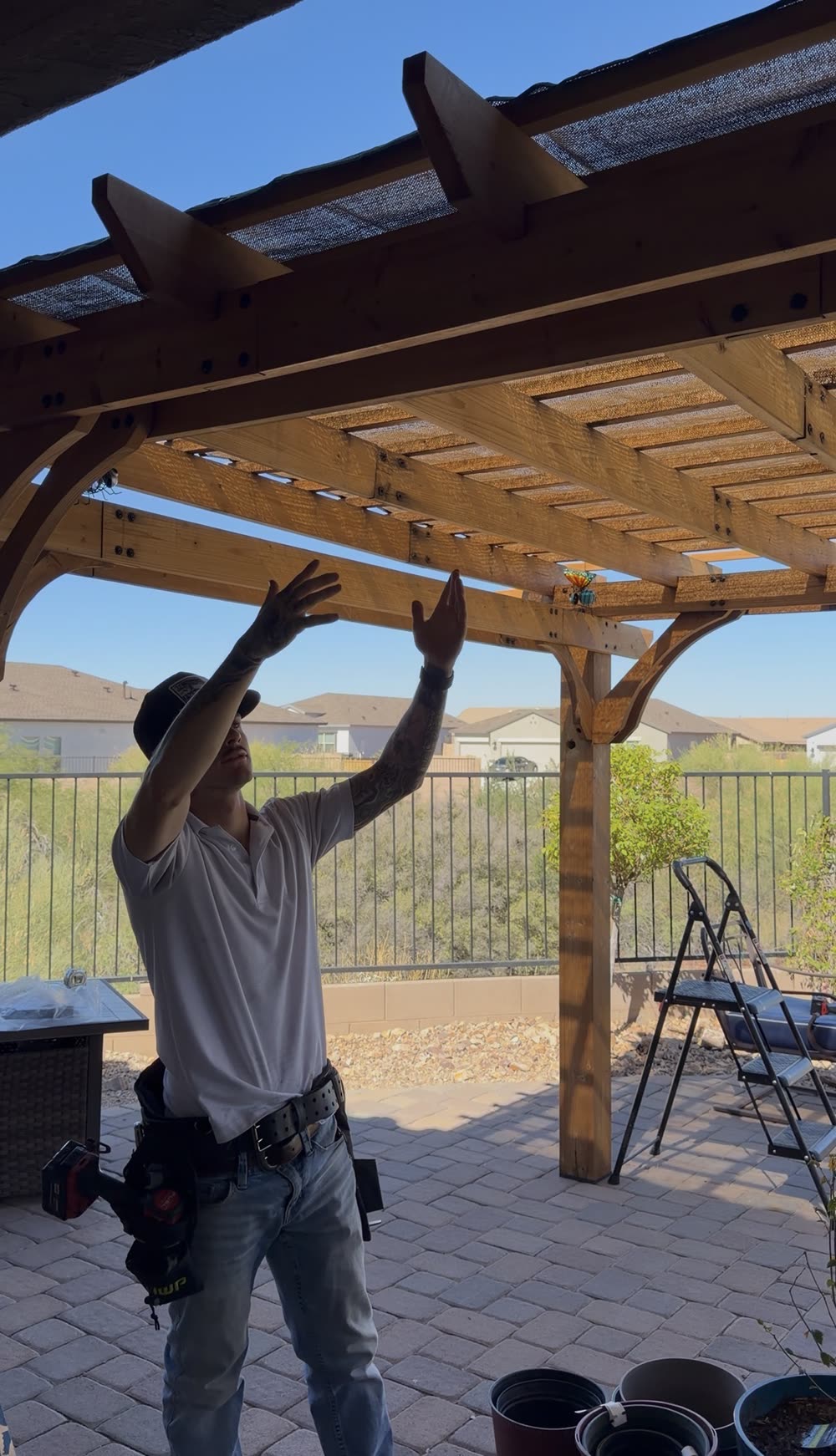 Pergola construction over a paver patio in Tucson, AZ